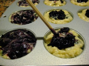 swirling blueberry jam into batter